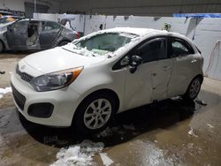 Salvage cars for sale at auction: 2013 KIA Rio EX