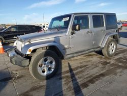 Salvage cars for sale at Grand Prairie, TX auction: 2014 Jeep Wrangler Unlimited Sahara