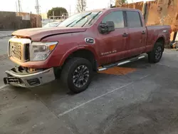 Salvage trucks for sale at Wilmington, CA auction: 2016 Nissan Titan XD SL