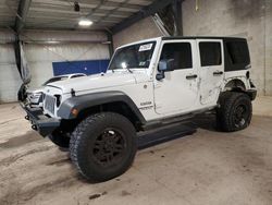 Salvage cars for sale from Copart Chalfont, PA: 2012 Jeep Wrangler Unlimited Sport