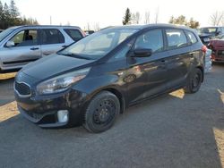 Salvage cars for sale from Copart Bowmanville, ON: 2014 KIA Rondo