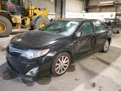 Salvage cars for sale at Eldridge, IA auction: 2012 Toyota Camry Hybrid