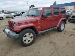 Vehiculos salvage en venta de Copart Woodhaven, MI: 2011 Jeep Wrangler Unlimited Sahara