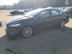 Salvage cars for sale at Arlington, WA auction: 2014 Ford Fusion SE