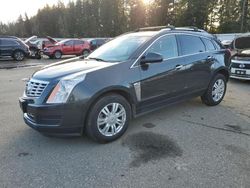 Salvage cars for sale at auction: 2014 Cadillac SRX Luxury Collection