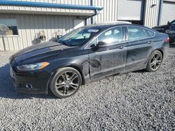 Salvage cars for sale at Earlington, KY auction: 2014 Ford Fusion Titanium