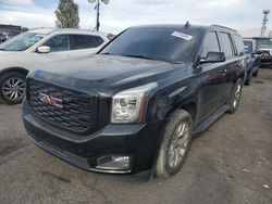 Salvage cars for sale at auction: 2019 GMC Yukon SLE