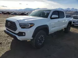 Salvage cars for sale at Magna, UT auction: 2023 Toyota Tacoma Double Cab