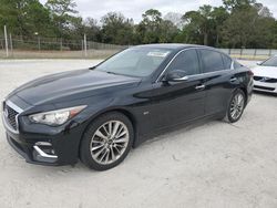 Salvage cars for sale from Copart Fort Pierce, FL: 2020 Infiniti Q50 Pure