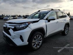 Salvage cars for sale from Copart Rancho Cucamonga, CA: 2019 Toyota Rav4 XLE Premium