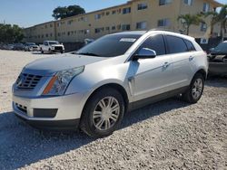 Flood-damaged cars for sale at auction: 2013 Cadillac SRX