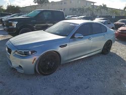 Salvage cars for sale at Opa Locka, FL auction: 2015 BMW M5