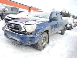 Salvage cars for sale at Montreal Est, QC auction: 2014 Toyota Tacoma Double Cab Long BED