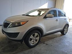 Salvage cars for sale at Orlando, FL auction: 2011 KIA Sportage LX