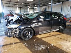 Salvage cars for sale from Copart Brighton, CO: 2014 Ford Focus Titanium