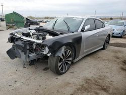 Salvage cars for sale at Tucson, AZ auction: 2012 Dodge Charger SRT-8