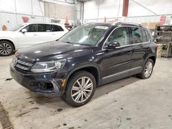 Salvage SUVs for sale at auction: 2014 Volkswagen Tiguan S