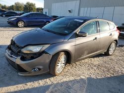 Salvage cars for sale at Apopka, FL auction: 2013 Ford Focus Titanium