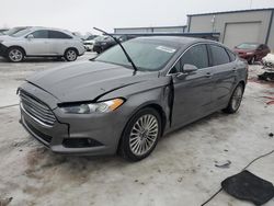 Salvage cars for sale at Wayland, MI auction: 2014 Ford Fusion Titanium