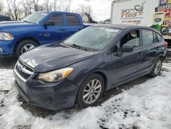 Subaru salvage cars for sale: 2014 Subaru Impreza Premium