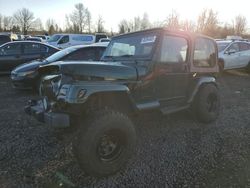 Salvage SUVs for sale at auction: 1998 Jeep Wrangler / TJ Sahara