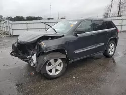 Jeep Grand Cherokee salvage cars for sale: 2011 Jeep Grand Cherokee Laredo