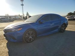 Salvage cars for sale at auction: 2019 Toyota Camry Hybrid