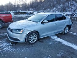 Volkswagen salvage cars for sale: 2011 Volkswagen Jetta SE