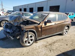 Salvage cars for sale at Jacksonville, FL auction: 2014 BMW X1 SDRIVE28I