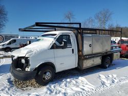 Salvage trucks for sale at West Warren, MA auction: 2013 GMC Savana Cutaway G4500