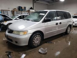 Honda Odyssey lx salvage cars for sale: 2002 Honda Odyssey LX