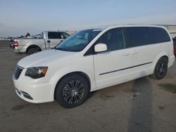 Salvage cars for sale from Copart Bakersfield, CA: 2014 Chrysler Town & Country S