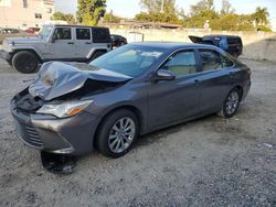 Salvage cars for sale at Opa Locka, FL auction: 2015 Toyota Camry LE