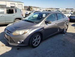 Salvage cars for sale at Earlington, KY auction: 2014 Ford Focus Titanium