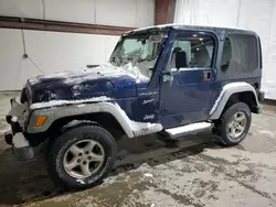 Salvage cars for sale from Copart Leroy, NY: 2002 Jeep Wrangler / TJ Sport