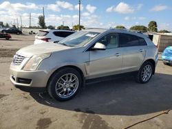 Salvage cars for sale at Miami, FL auction: 2014 Cadillac SRX Premium Collection