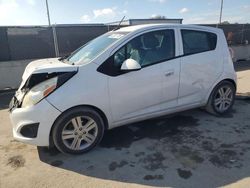 Salvage cars for sale at Orlando, FL auction: 2014 Chevrolet Spark 1LT