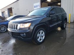 Salvage SUVs for sale at auction: 2012 Jeep Grand Cherokee Laredo