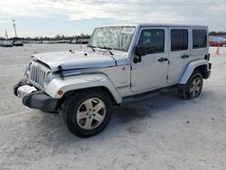 Salvage cars for sale at Arcadia, FL auction: 2012 Jeep Wrangler Unlimited Sahara