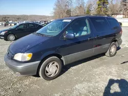 Salvage cars for sale from Copart Concord, NC: 2001 Toyota Sienna LE