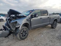 Salvage cars for sale at Houston, TX auction: 2019 Nissan Titan XD SL