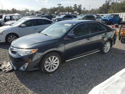 2012 Toyota Camry Hybrid en venta en Riverview, FL