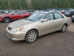 Vehiculos salvage en venta de Copart Graham, WA: 2003 Toyota Camry LE