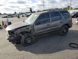 Carros salvage a la venta en subasta: 2004 Mazda Tribute LX