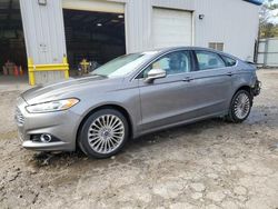 Salvage cars for sale at auction: 2014 Ford Fusion Titanium