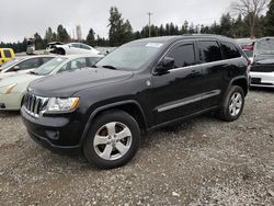 Salvage cars for sale at Graham, WA auction: 2011 Jeep Grand Cherokee Laredo