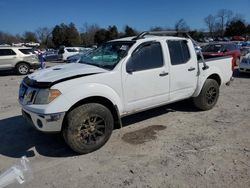 Salvage cars for sale from Copart Madisonville, TN: 2009 Nissan Frontier Crew Cab SE