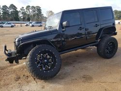 Salvage cars for sale from Copart Longview, TX: 2015 Jeep Wrangler Unlimited Sport