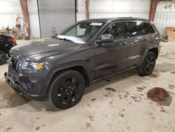 Vehiculos salvage en venta de Copart Lansing, MI: 2014 Jeep Grand Cherokee Laredo