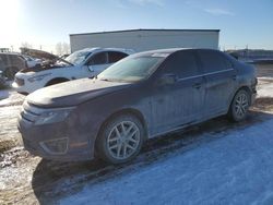 Salvage cars for sale from Copart Rocky View County, AB: 2012 Ford Fusion SEL